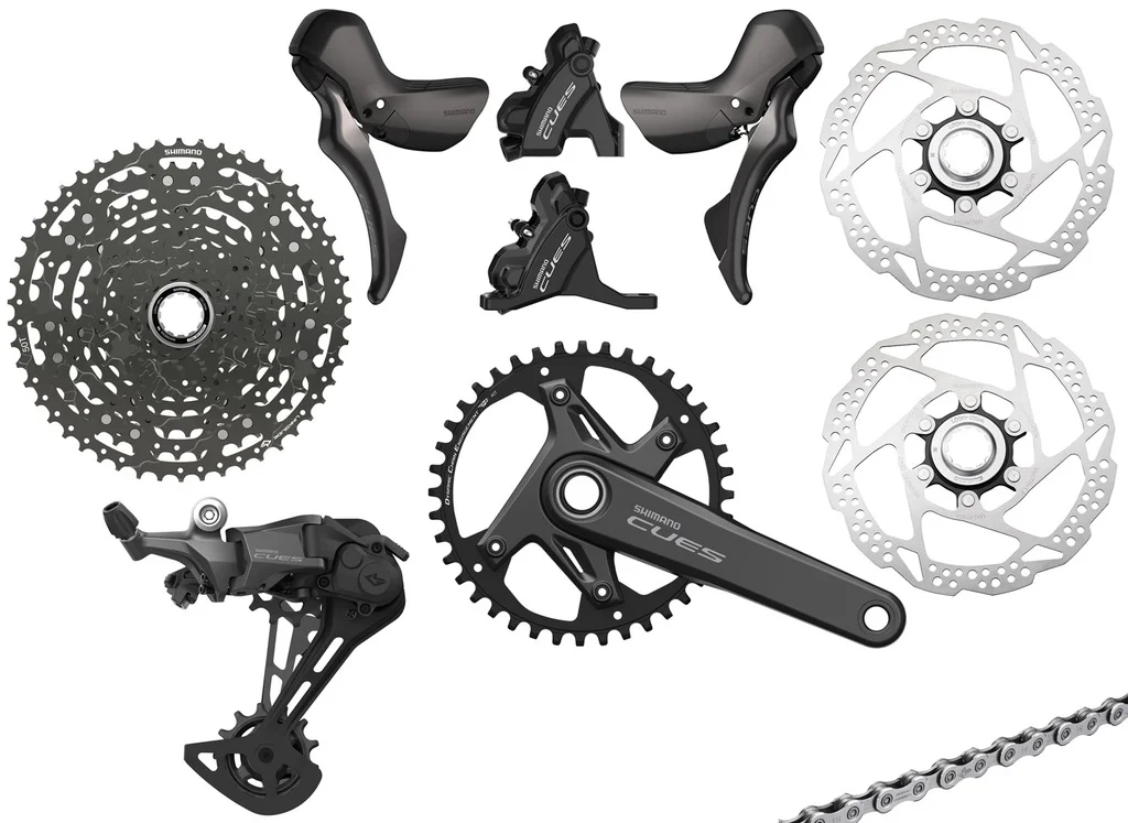 Shimano (Group)11s, Cues U6030, 2x prestavno zavorna ročka, 2x zavorna čeljust, 2x zavorni disk RT54-160, gonilka, zadnji menjalnik RD-U6000 , verižnik LG400 11s, veriga LG500